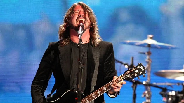 What are the Foo Fighters teasing in new, very dark studio photos?